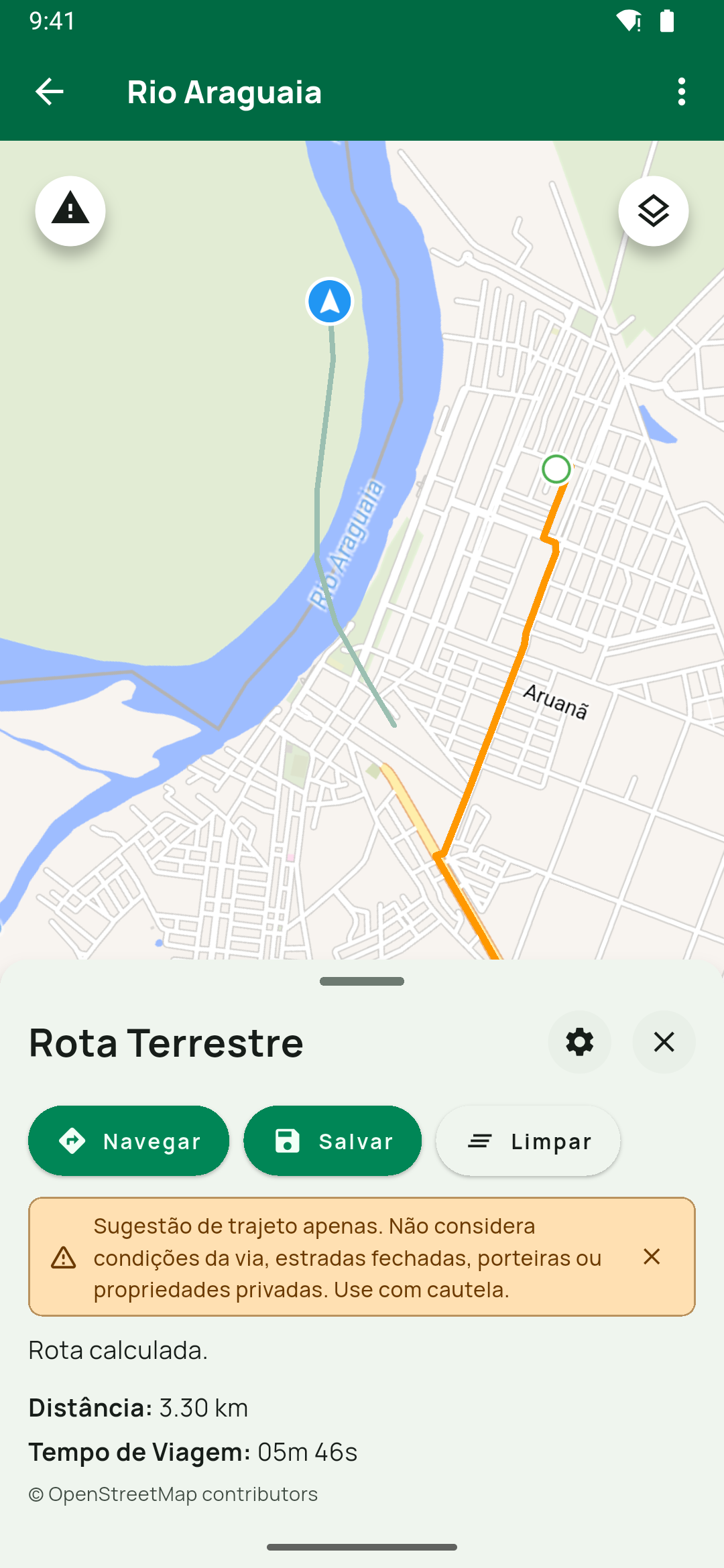 Painel Rota Terrestre calculado em modo avião, com a região baixada: Salvar na cor de destaque e Limpar, o aviso Sugestão de trajeto apenas…, Rota calculada., Distância, Tempo de V
