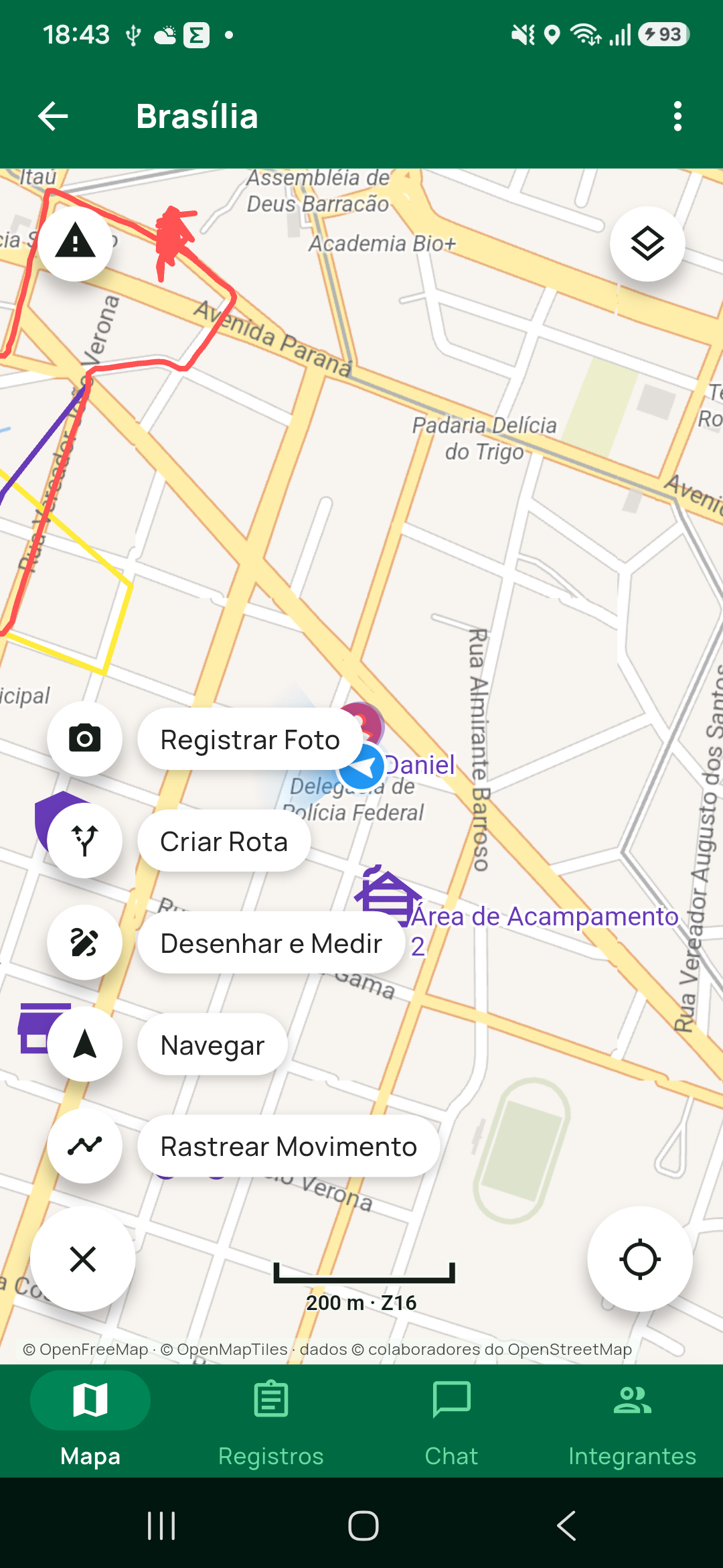 Menu ☰ do mapa aberto, com os cinco itens atuais na ordem real: Registrar Foto, Criar Rota, Desenhar e Medir, Navegar e Rastrear Movimento, mais o ✕ que fecha o menu.